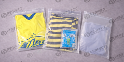 clear garment bags with folded clothes